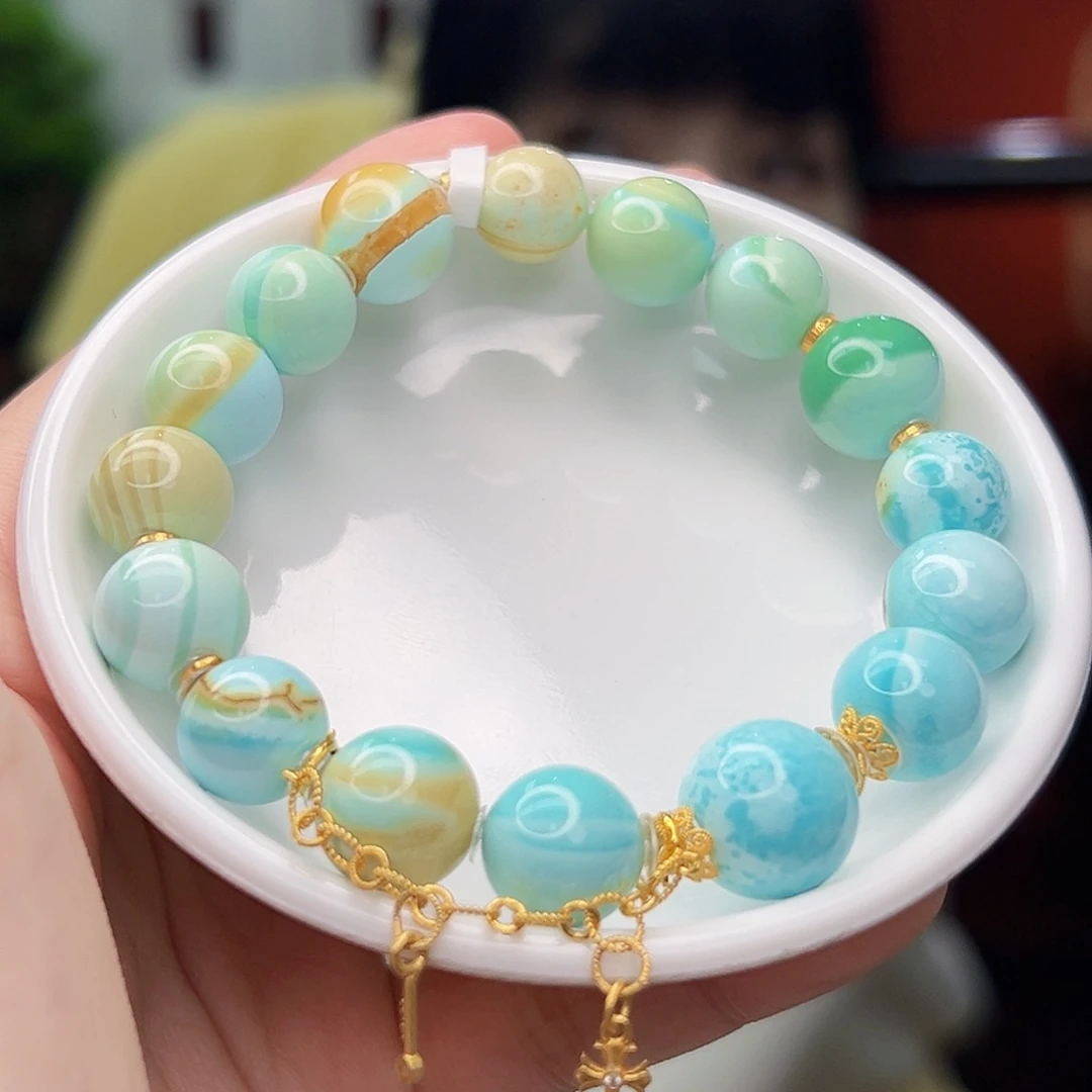 杨***二绿松石18K金镶嵌珠宝奇石