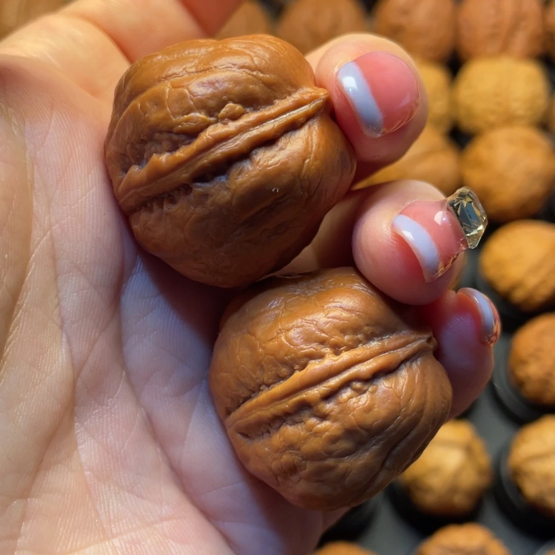 姜***富文玩核桃把件十级