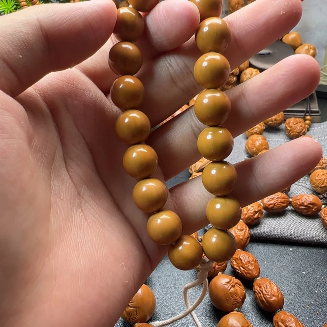 橄榄核手串/手链猴头光珠