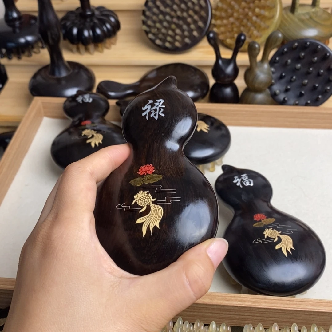紫光檀按摩梳子按摩