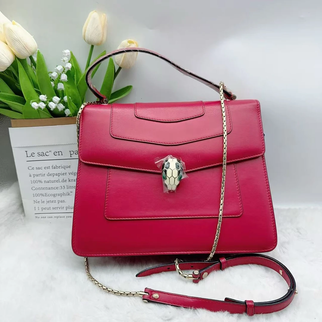 95新 BVLGARI/宝格丽 粉红色蛇头手提风琴包 1134 4425