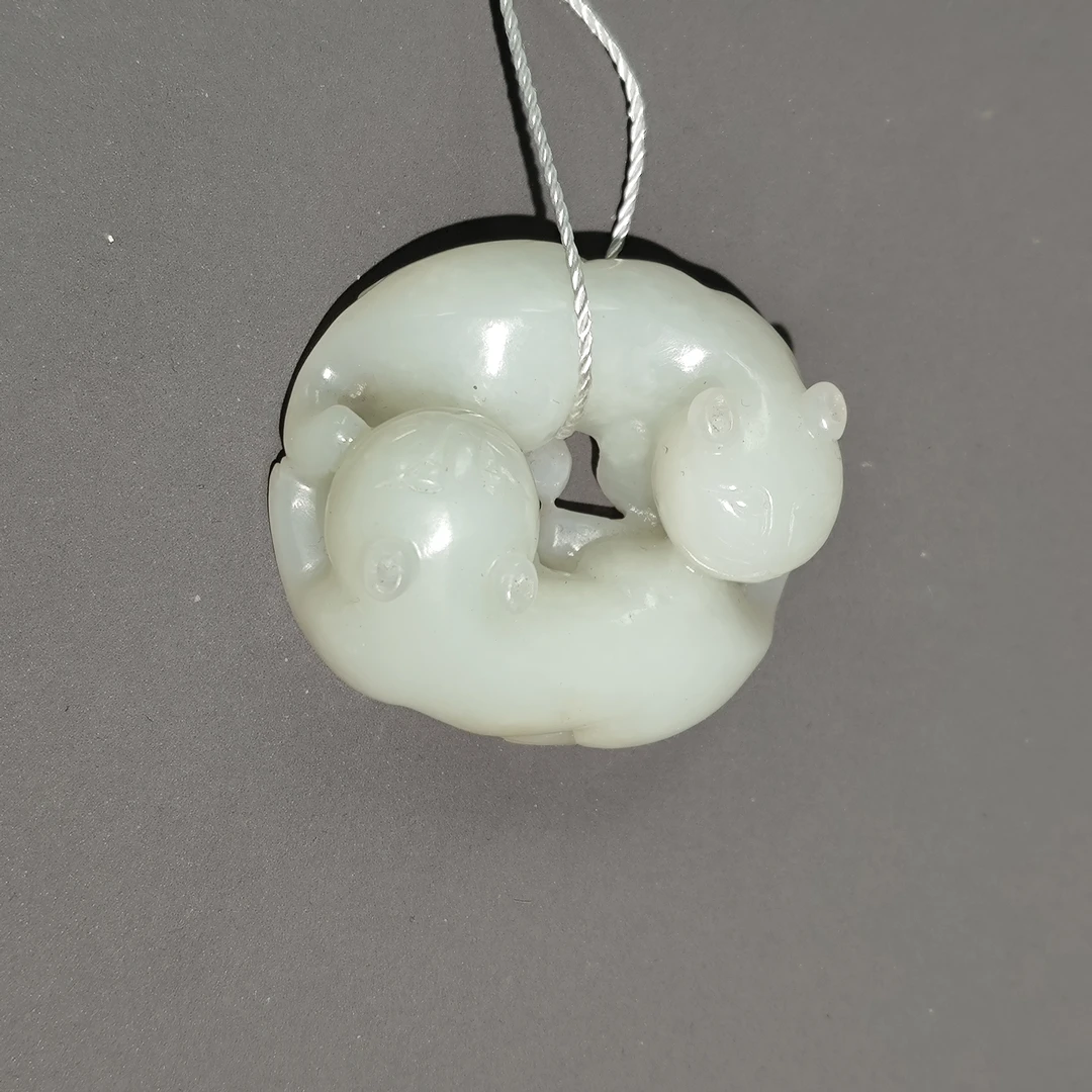 清代和田玉双欢把件