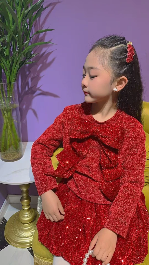 红色蝴蝶结亮片毛衣