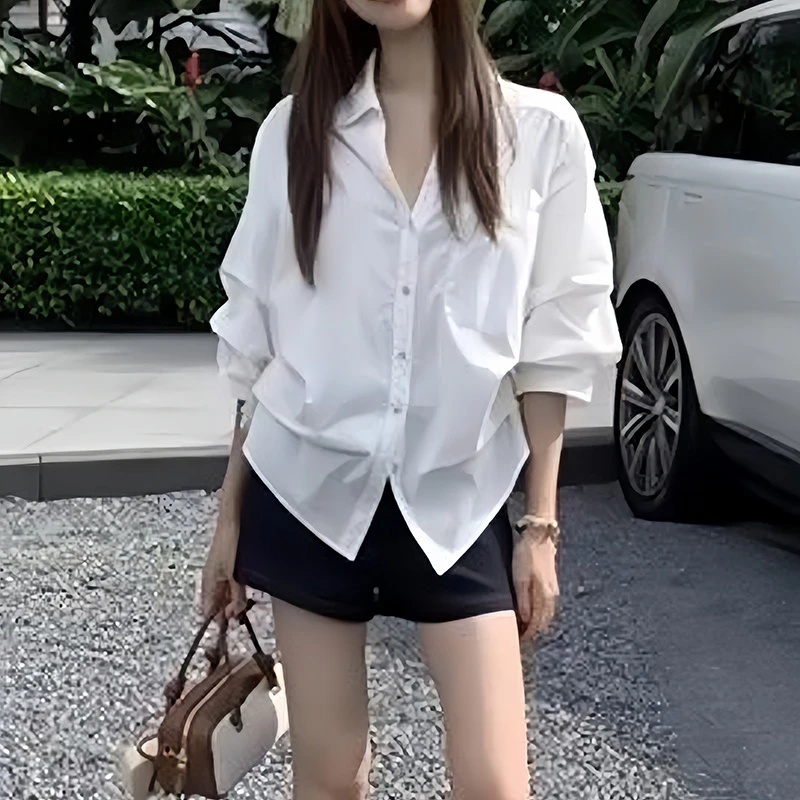 早秋新款设计感高级感泡泡袖上衣女韩系别致气质收腰显瘦白色衬衫