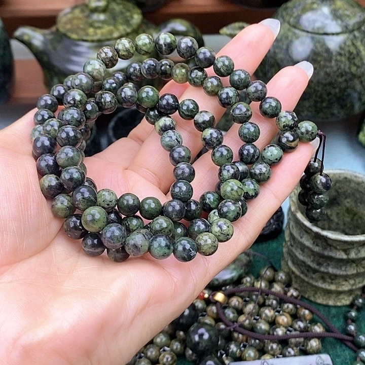 玥***举蛇纹石玉未镶嵌108颗