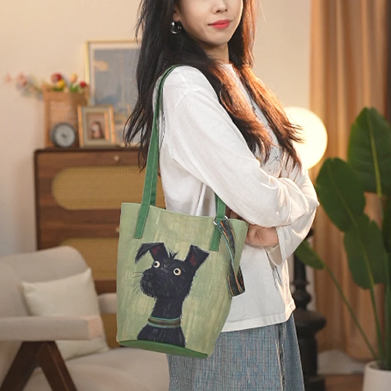 插画师款原创青衣黑狗细肩带水桶包通勤大容量单肩斜跨包帆布女包