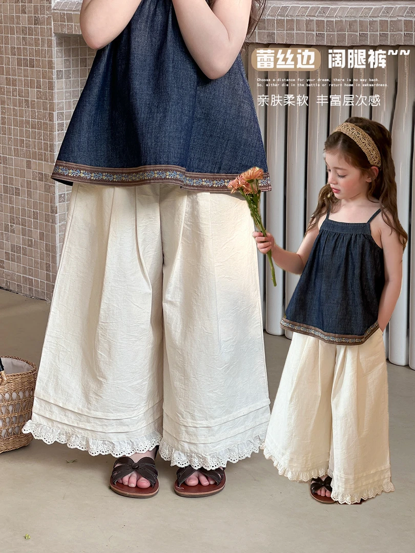 【依妈童品】女童棉花籽色时髦童裤度假风压褶花边阔腿裤25B033