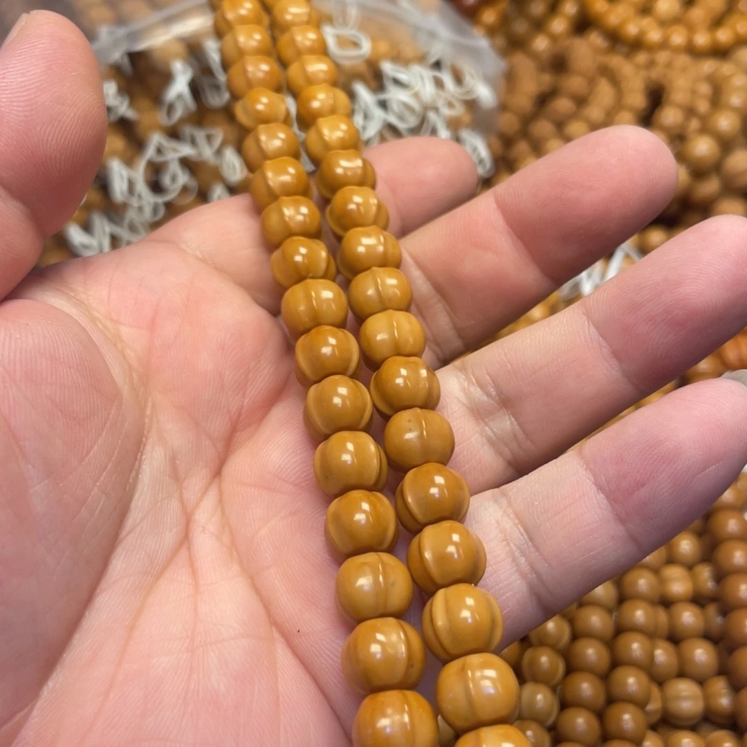 猴头核桃吊坠小鲨鱼手串黑点