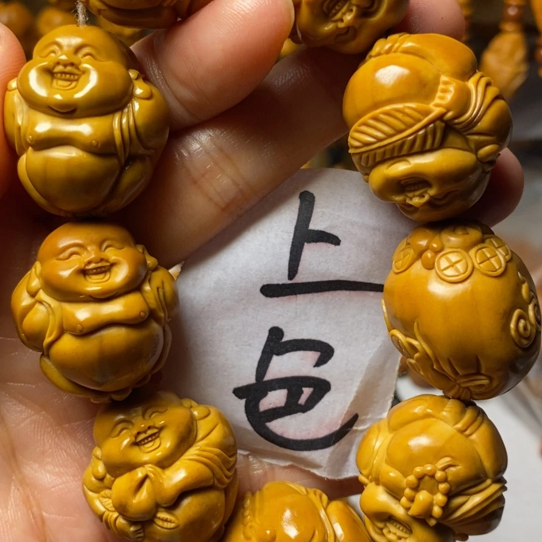 棋***懿橄榄核手串八大弥勒