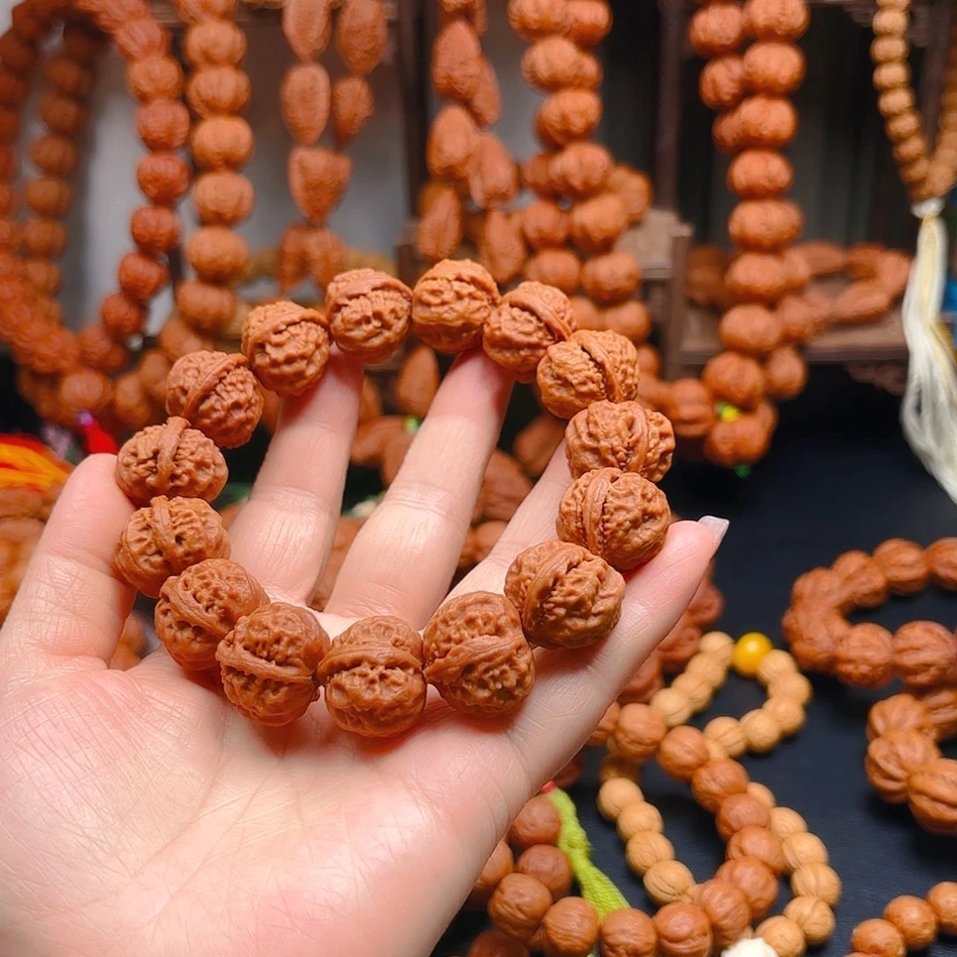 乐***水文玩核桃吊坠核桃手串