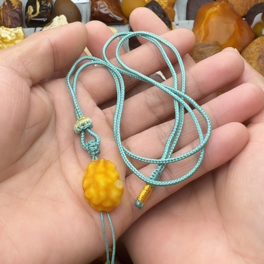 蜜蜡珠宝奇石未镶嵌大***?天然蜜蜡海飘吊坠