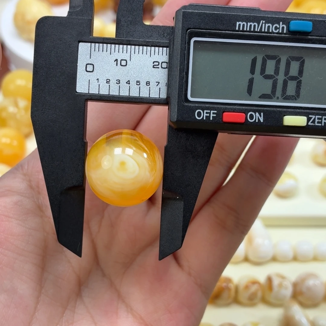 琥珀未镶嵌珠宝奇石焦皮金橘白溶洞台风眼圆珠19.8mm