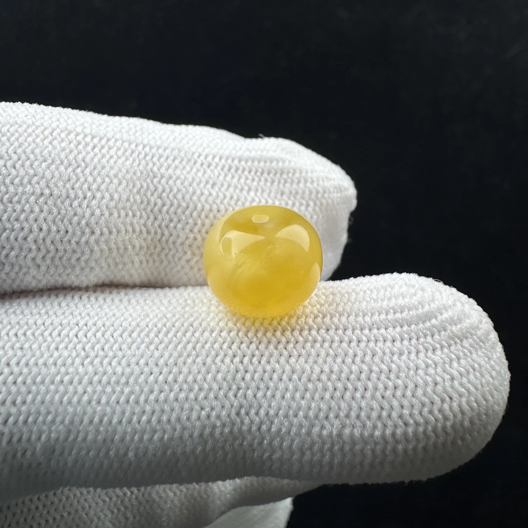 J8340天然原矿俄料蜜蜡墩子10.7*8.4mm支持复检假一罚十