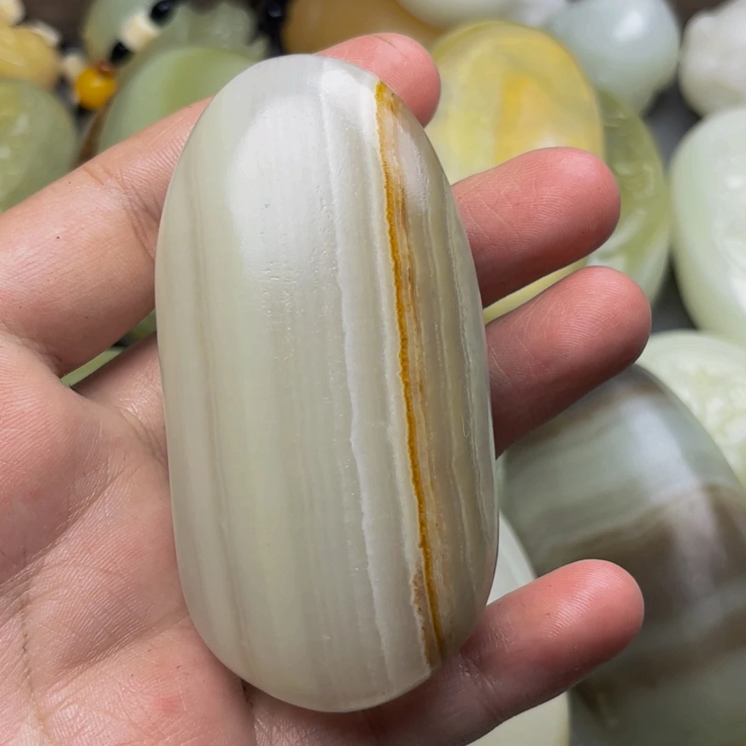 E***i石材方解石手把件