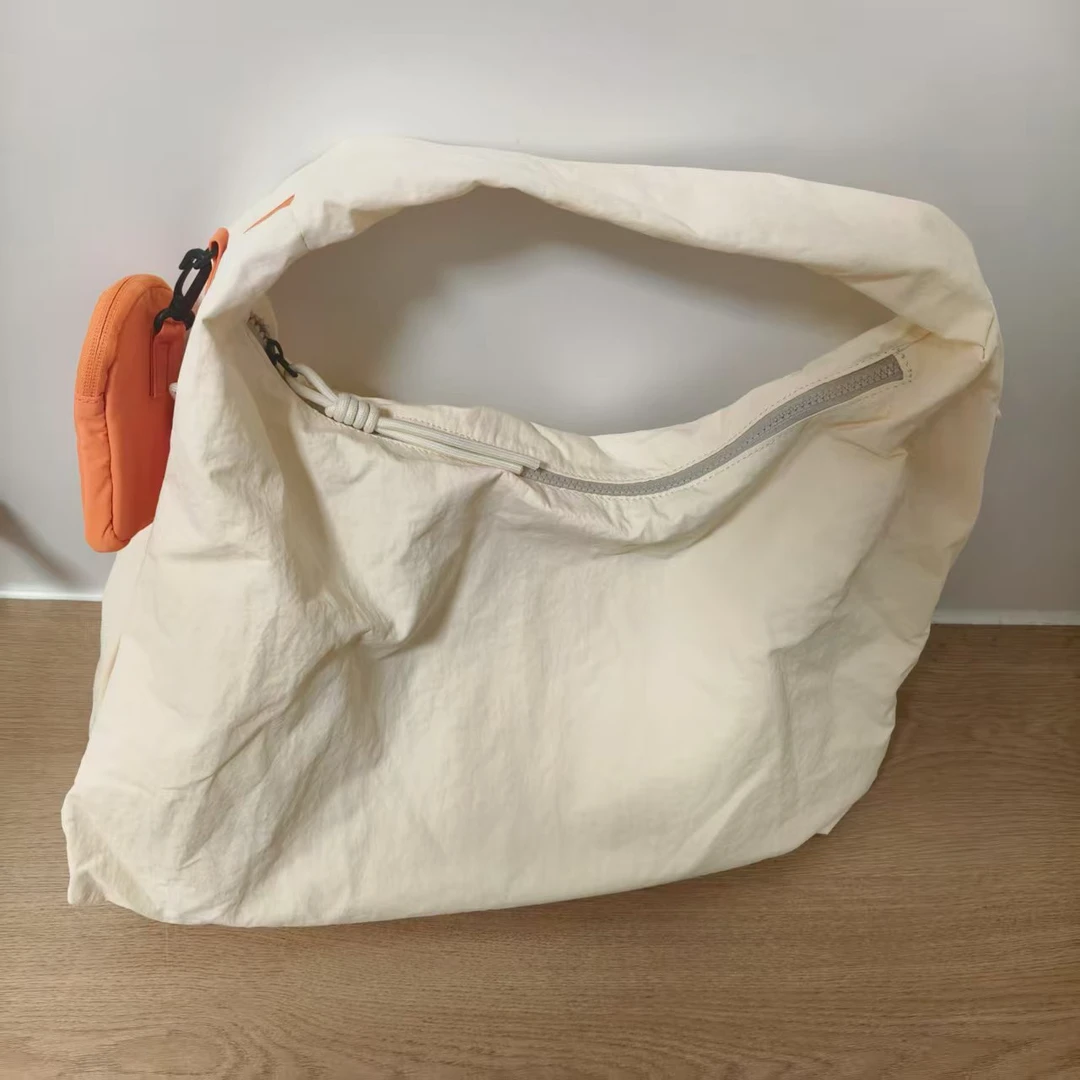 801浅黄色时尚手拎斜挎包