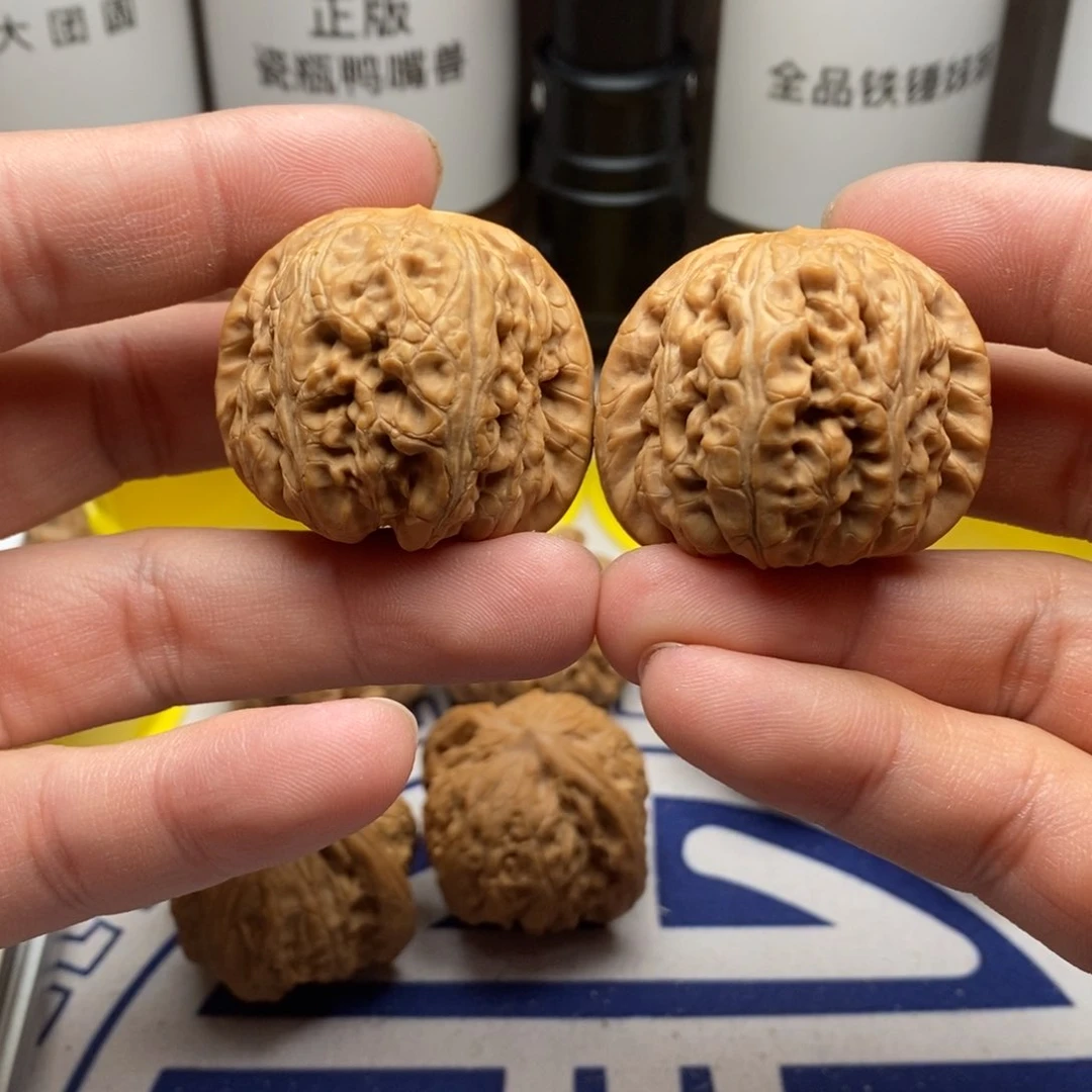 核桃把件悠四二元宝