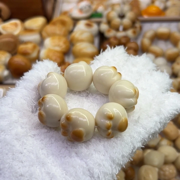 菩提根/象牙果把件35 象牙果原果雕刻炭烧猫爪微瑕