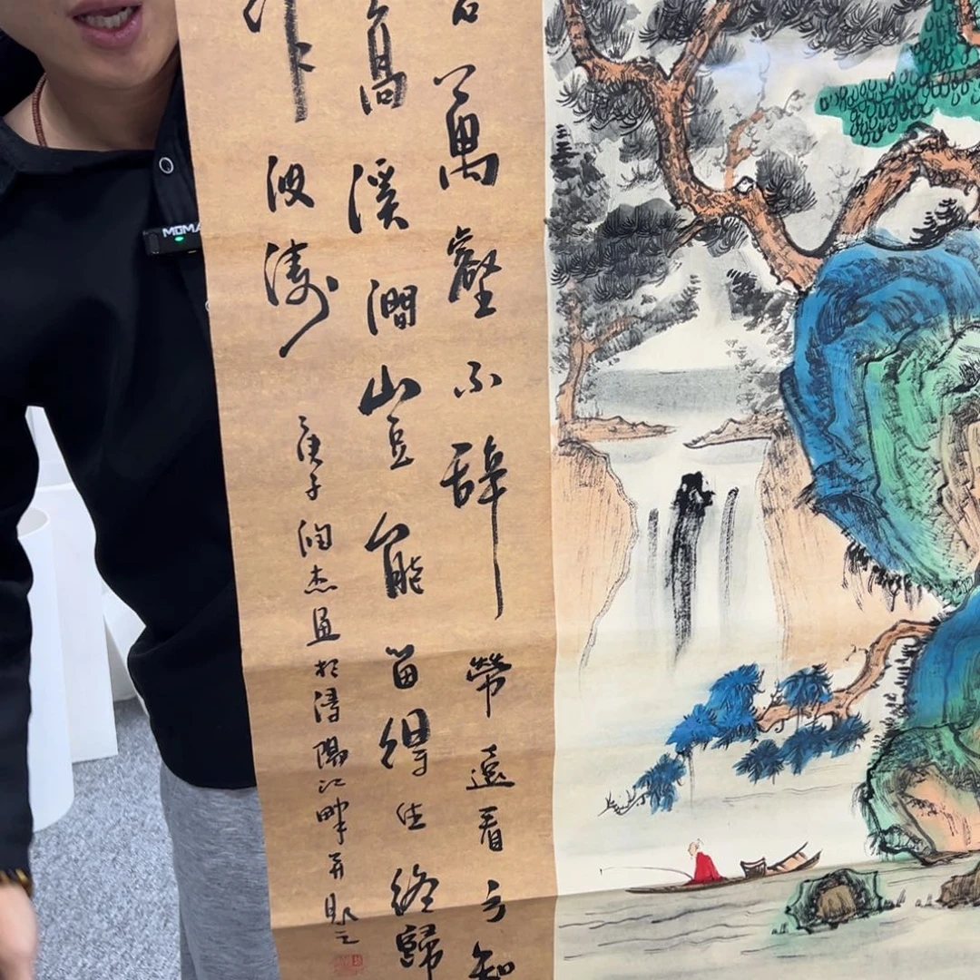 国画卖字画的小男孩