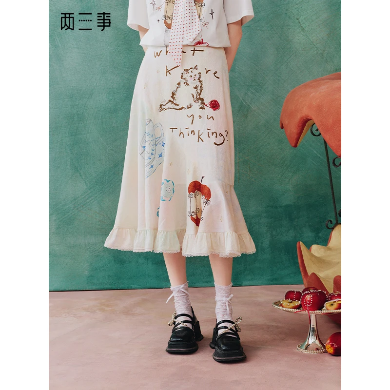 两三事【靳兆心联名款】魔幻派对2025夏新款印花荷叶边摆a字半身裙