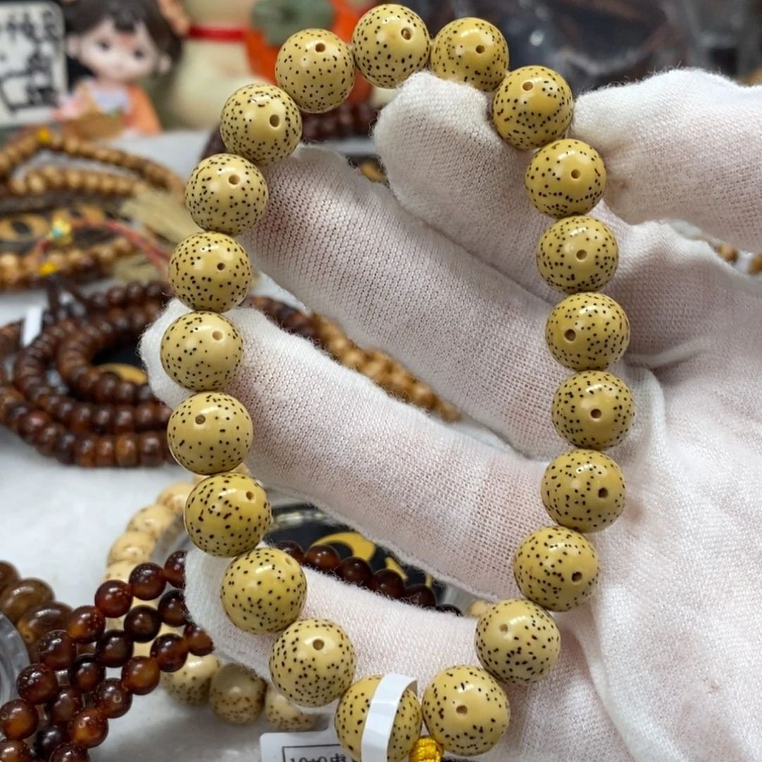 手串星月菩提10.5圆珠金黄色一线天留白