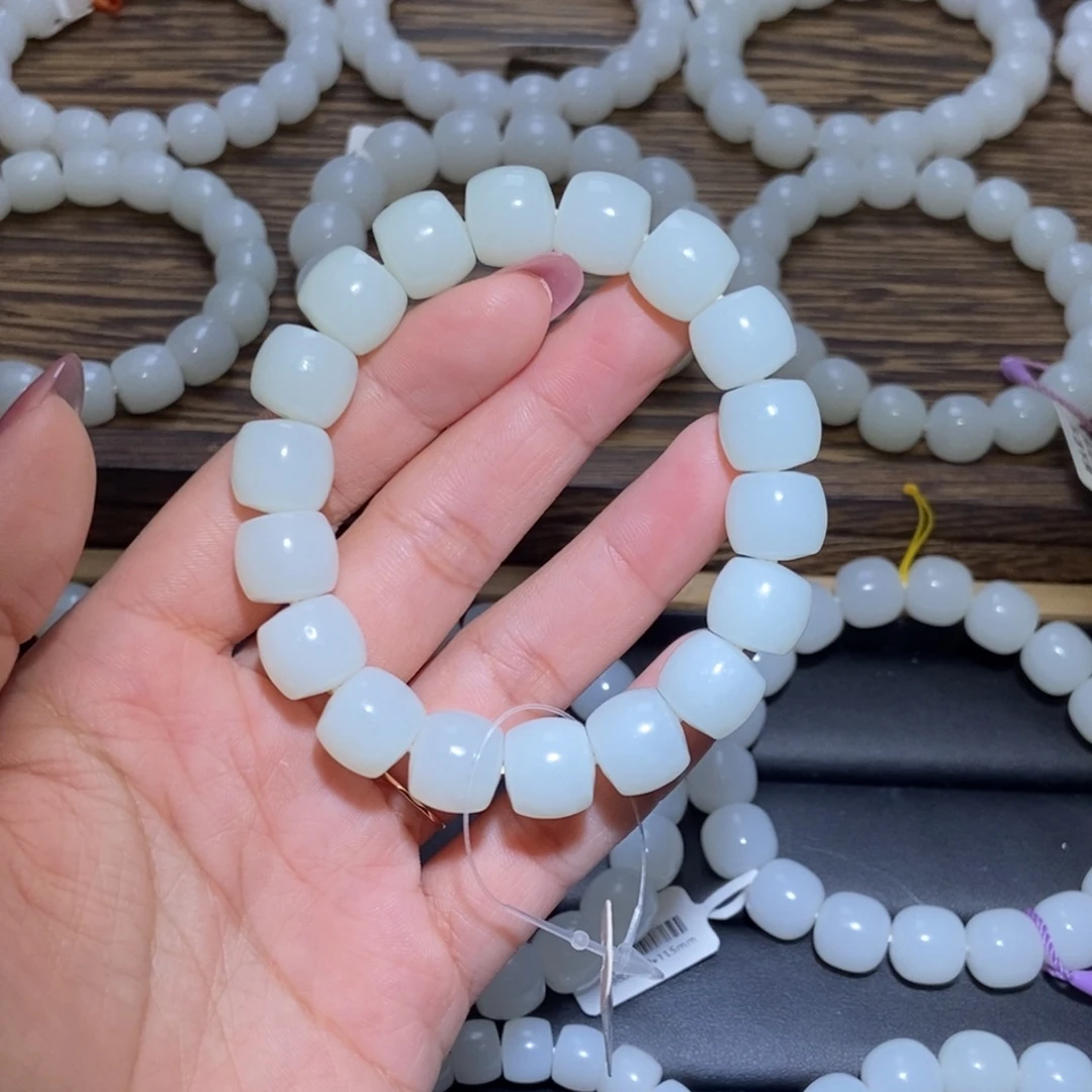 李***.和田玉未镶嵌手串卡12直切