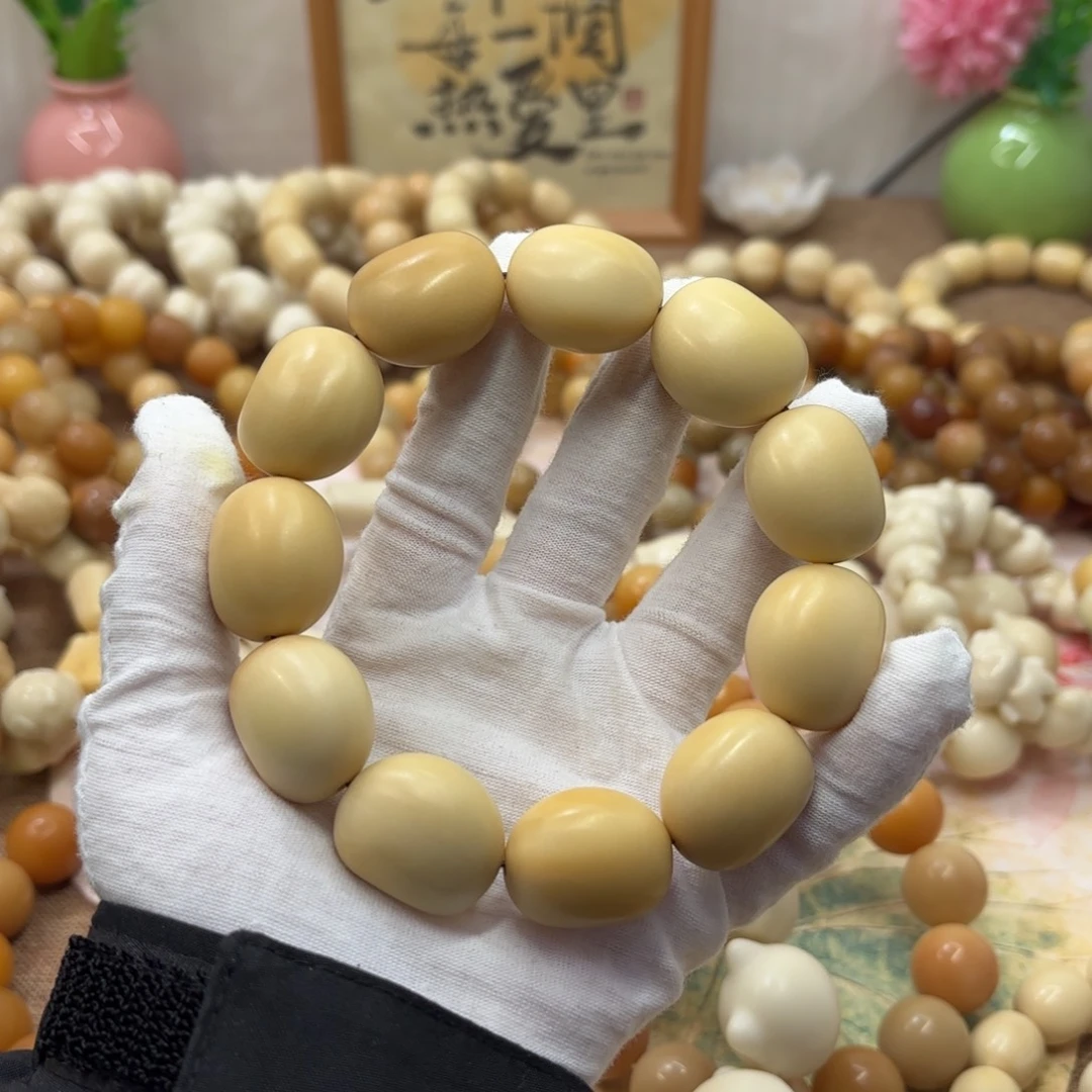吊坠菩提根/象牙果25干磨瑕疵牙果月亮067