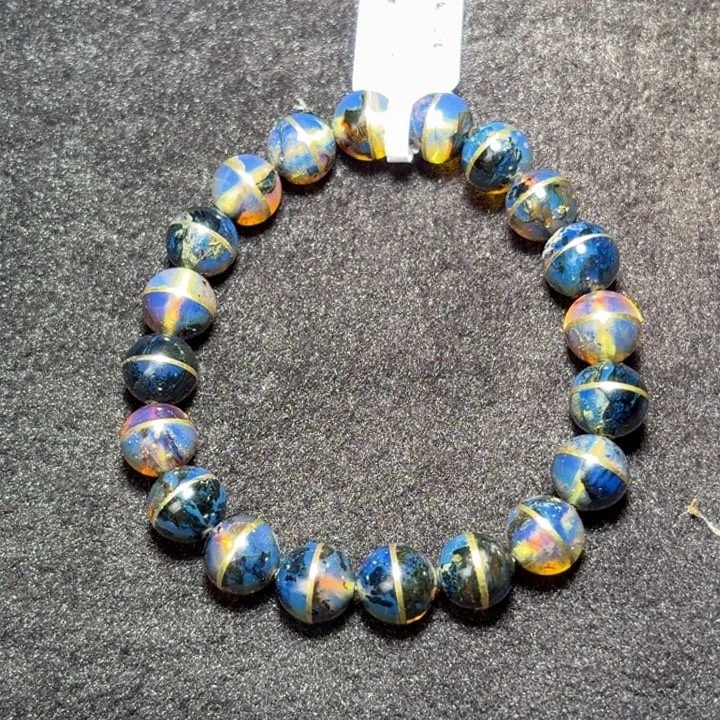 琥珀未镶嵌珠宝奇石9.8mm星际蓝海藻一线天