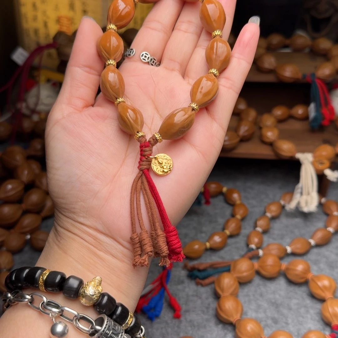 橄榄核手串?1.4*2.3正宗梅林铁核