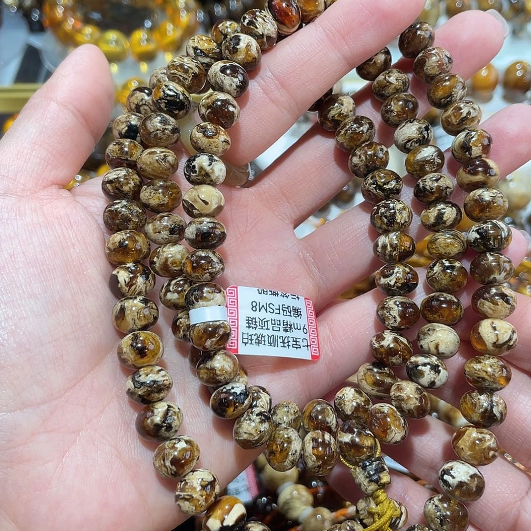 王***道琥珀未镶嵌手链9m洞