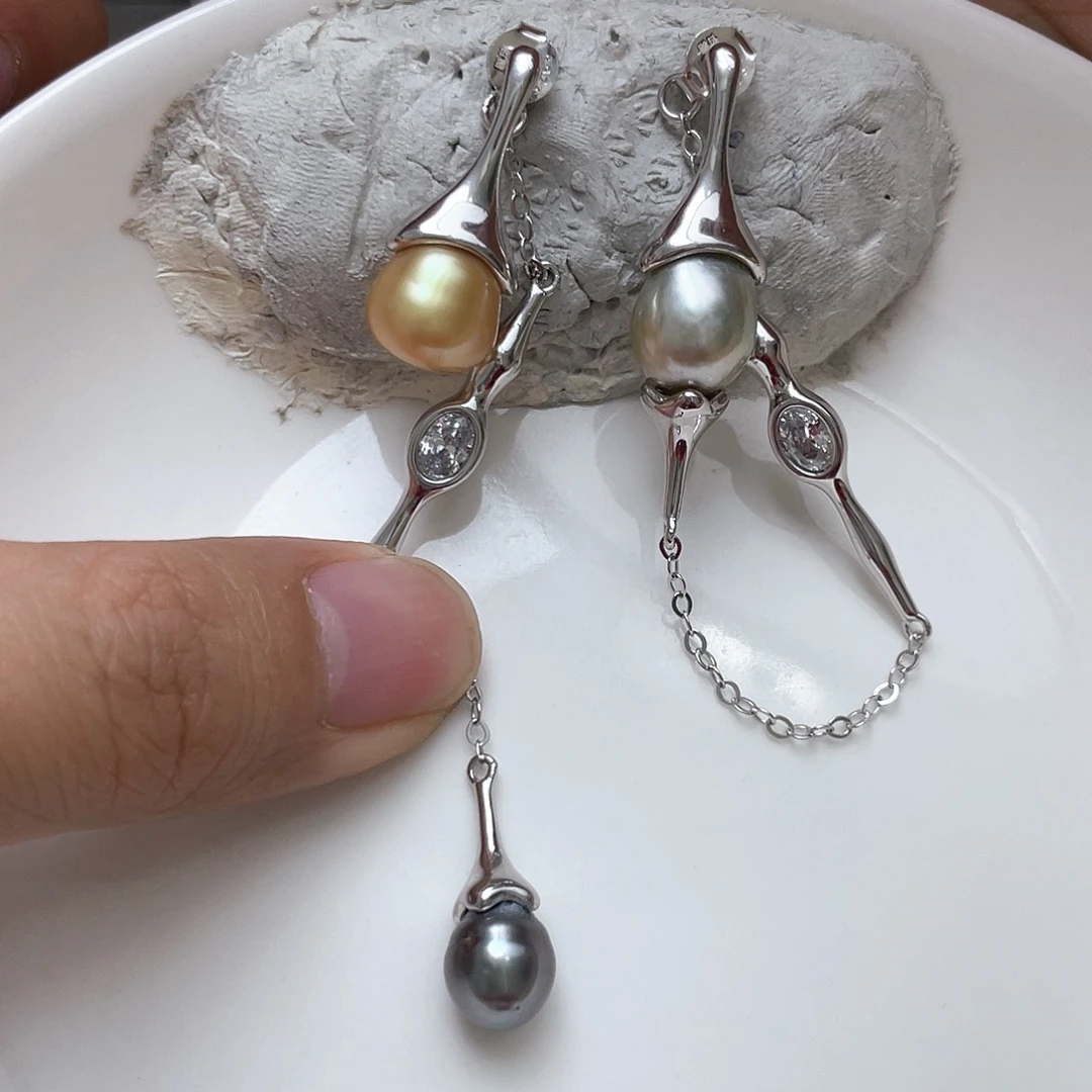 银S925镶嵌海水珍珠耳饰瓜***脚