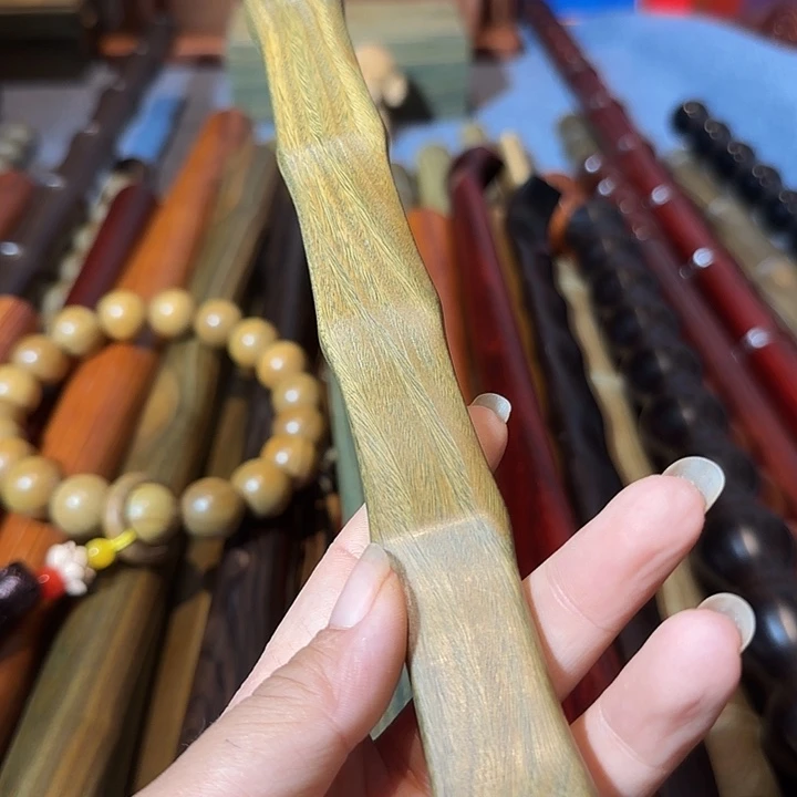 绿檀痒痒挠一个个