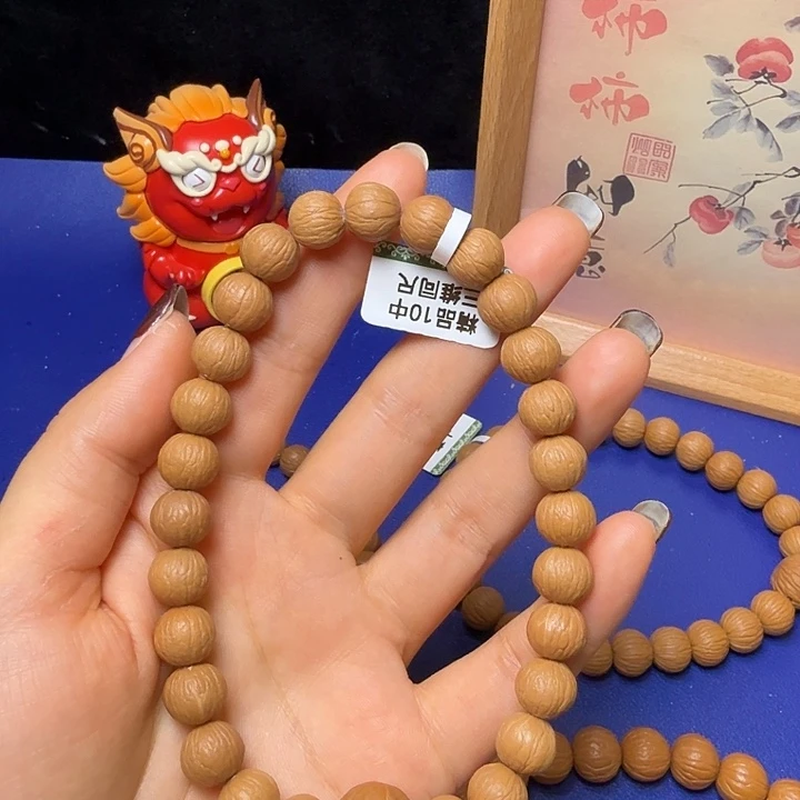 用***3猴头核桃手串凤羽