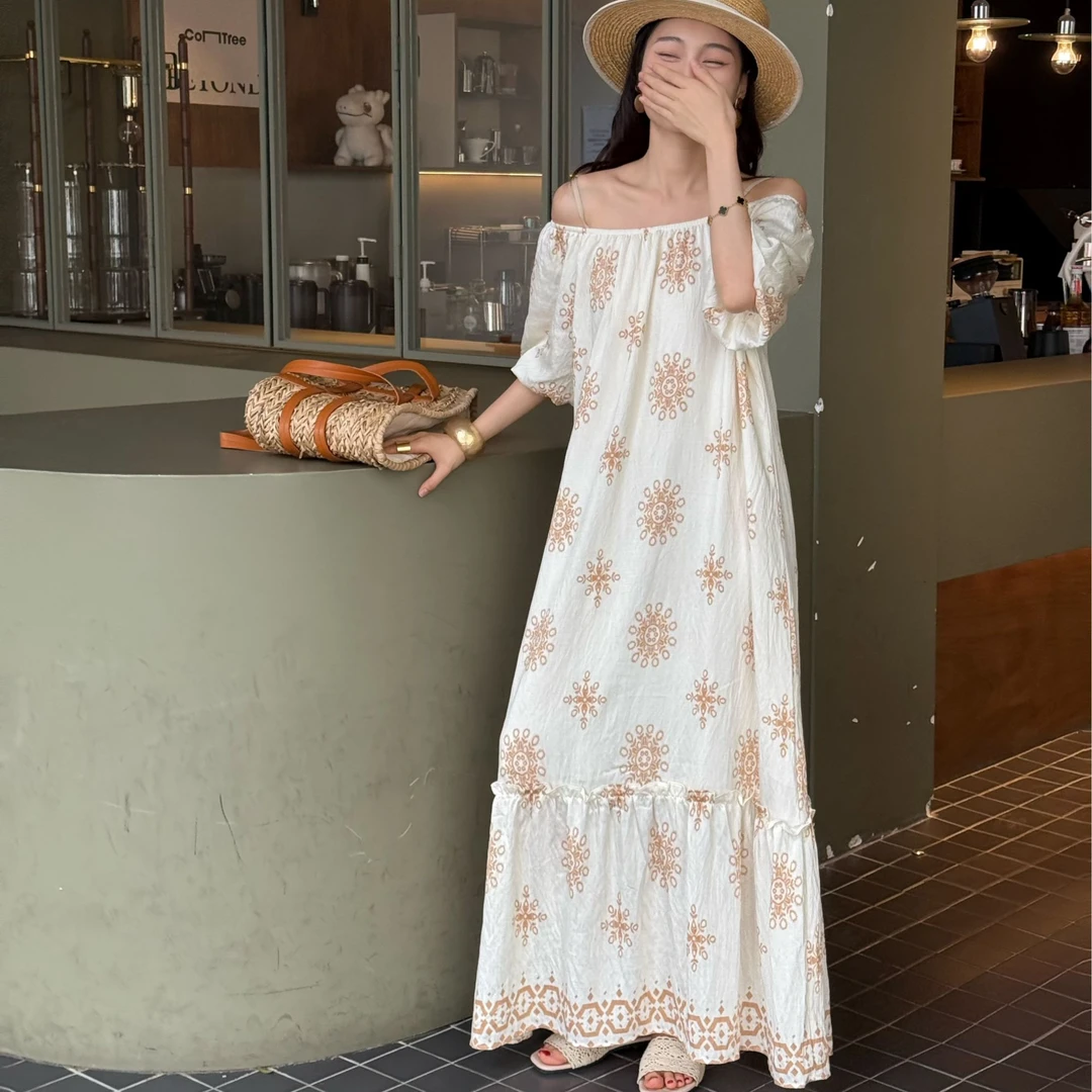 法式气质大摆长裙女2025夏季新款别致慵懒风印花碎花连衣裙