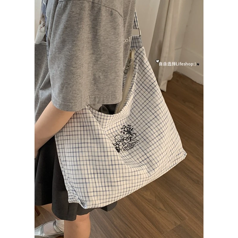 大容量帆布包包女款爆款2025新款通勤上班单肩包百搭休闲托特包