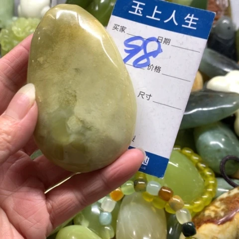 晴***里蛇纹石玉未镶嵌手把件