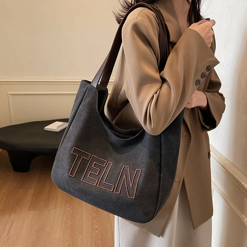 大容量帆布托特包女2025新款潮休闲字母单肩通勤包百搭上课通勤包