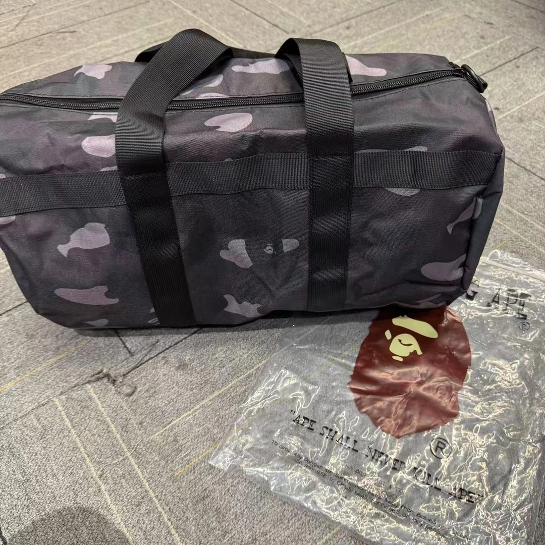 猿人头 （杂志附录包）黑色迷彩桶包潮流周边 2505230203C