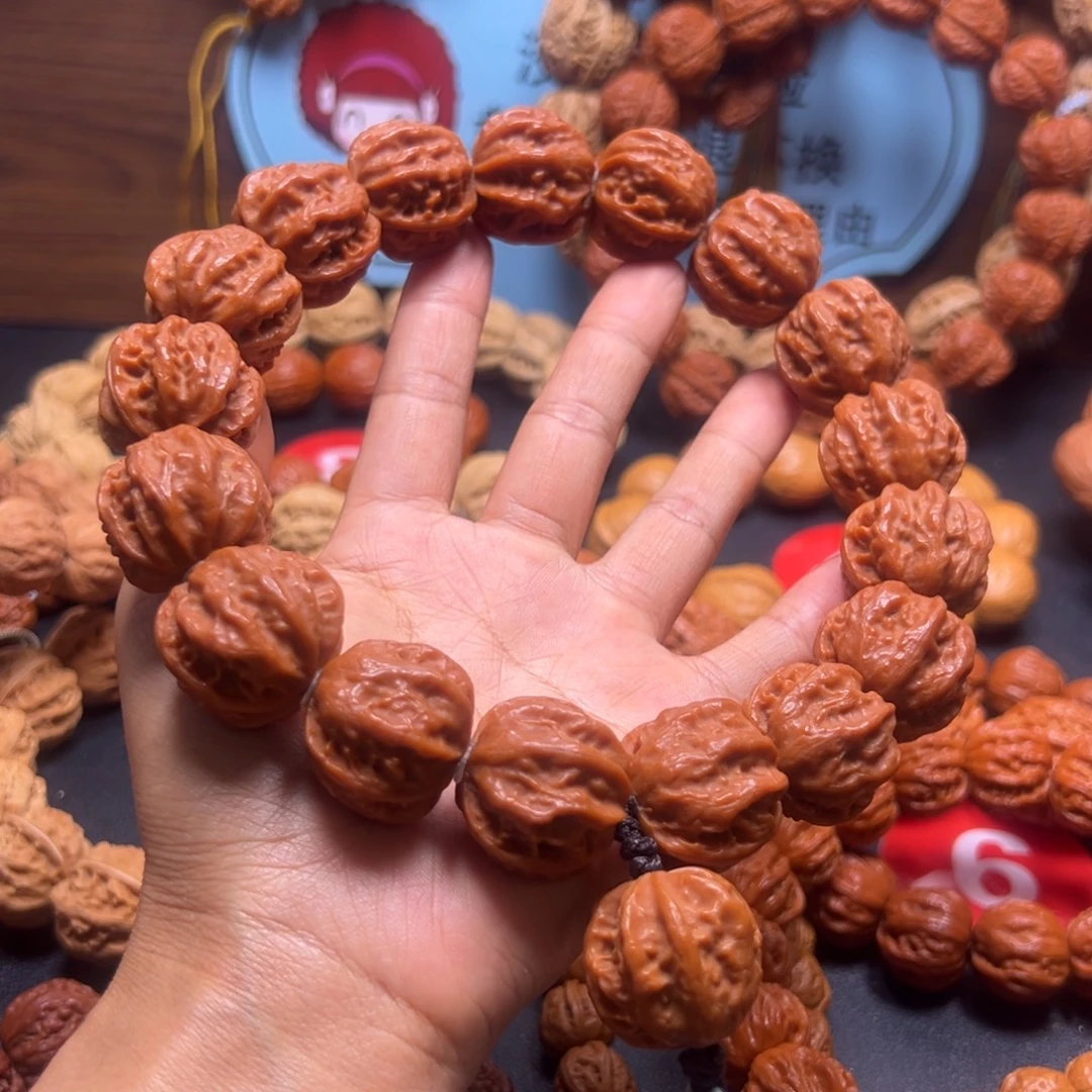杨****吊坠文玩核桃野生小核桃25加