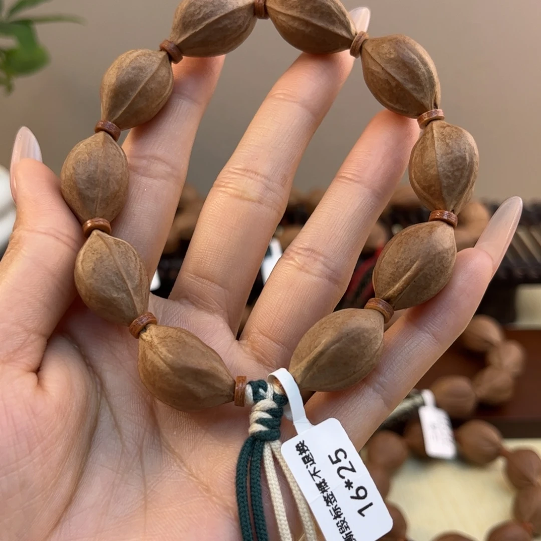 S***n吊坠橄榄核梅林铁核文玩手串