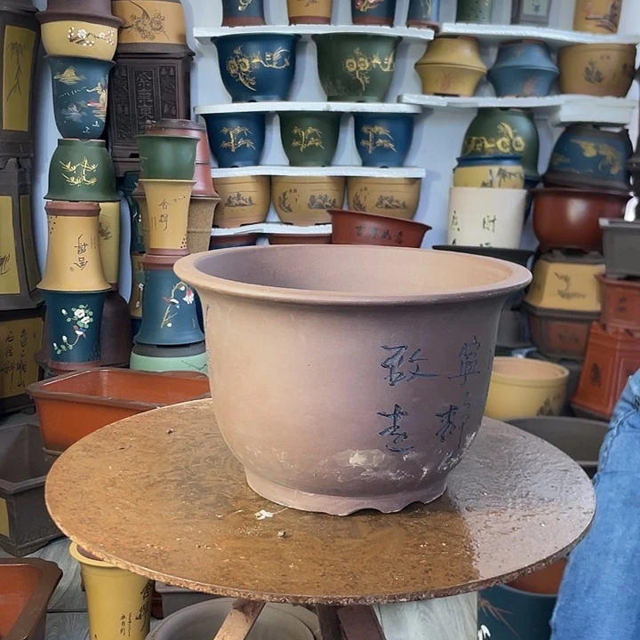 宜兴紫砂30平角金钟