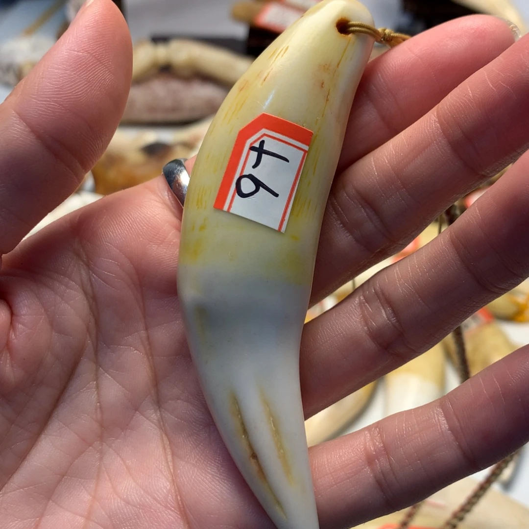 驼骨把件驼骨把件黄色牙牙