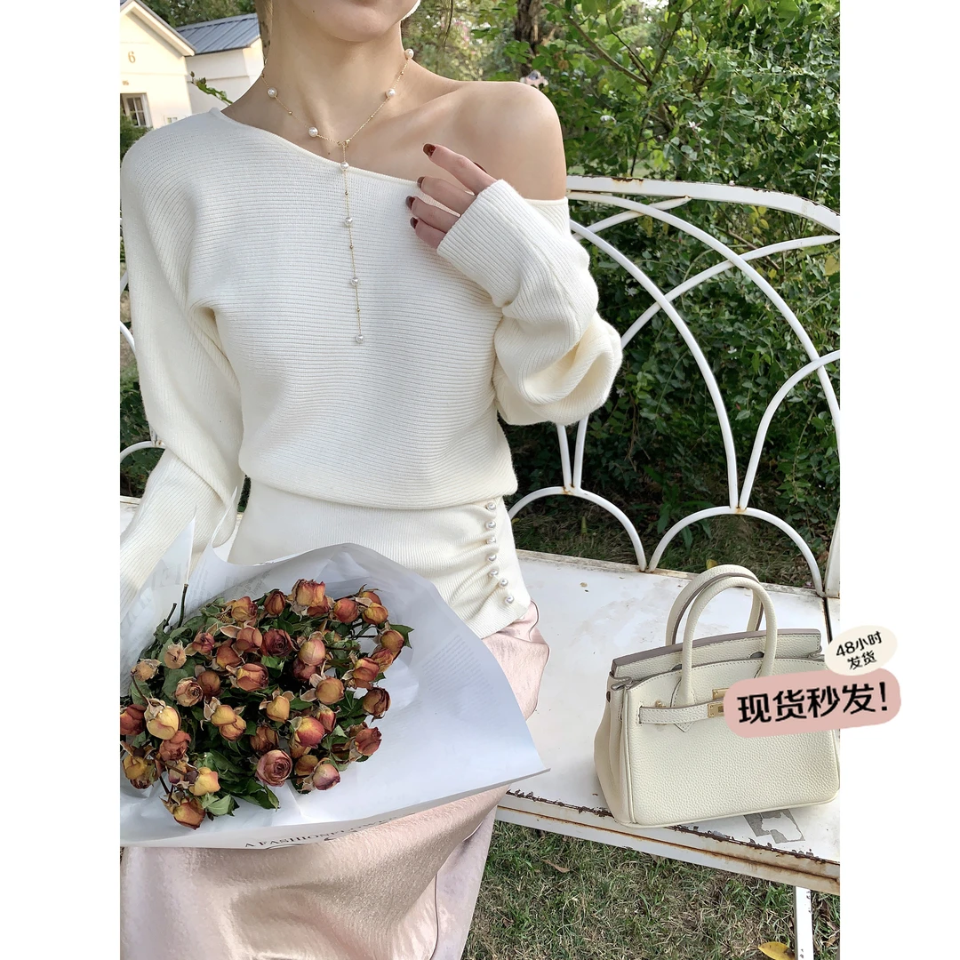 万万不熬夜【创意百搭】早春新款斜领不对称纽扣收腰设计感针织毛衣