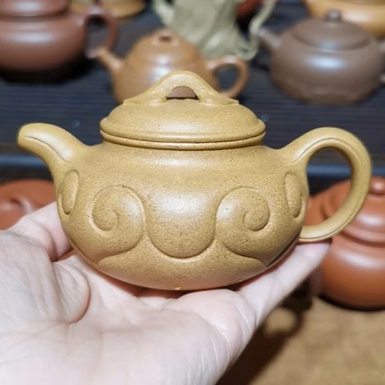 随***然紫砂茶壶仿古如意壶半手