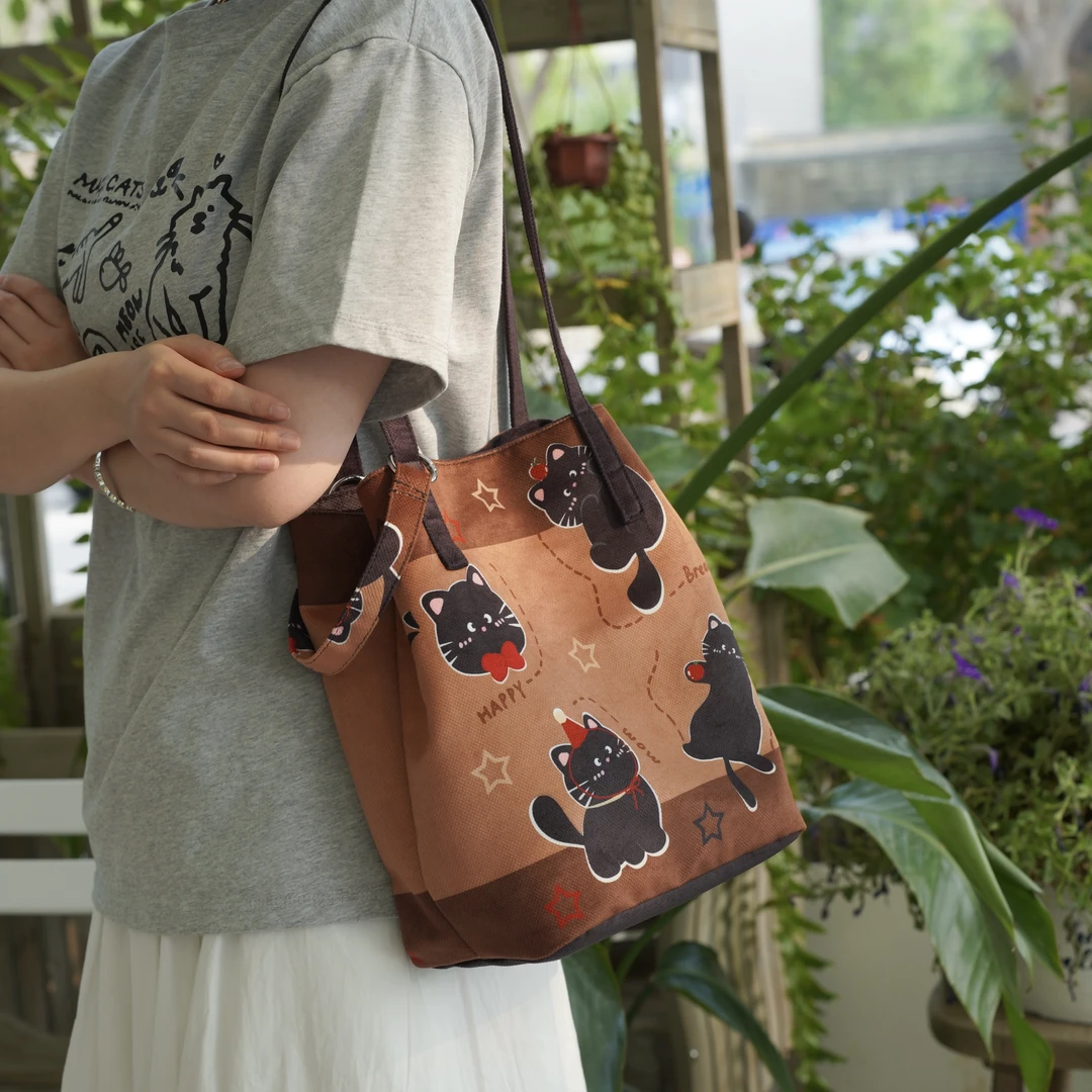 盾盾熊设计大容量俏皮黑猫休闲时尚百搭通勤单肩斜跨手提水桶托特