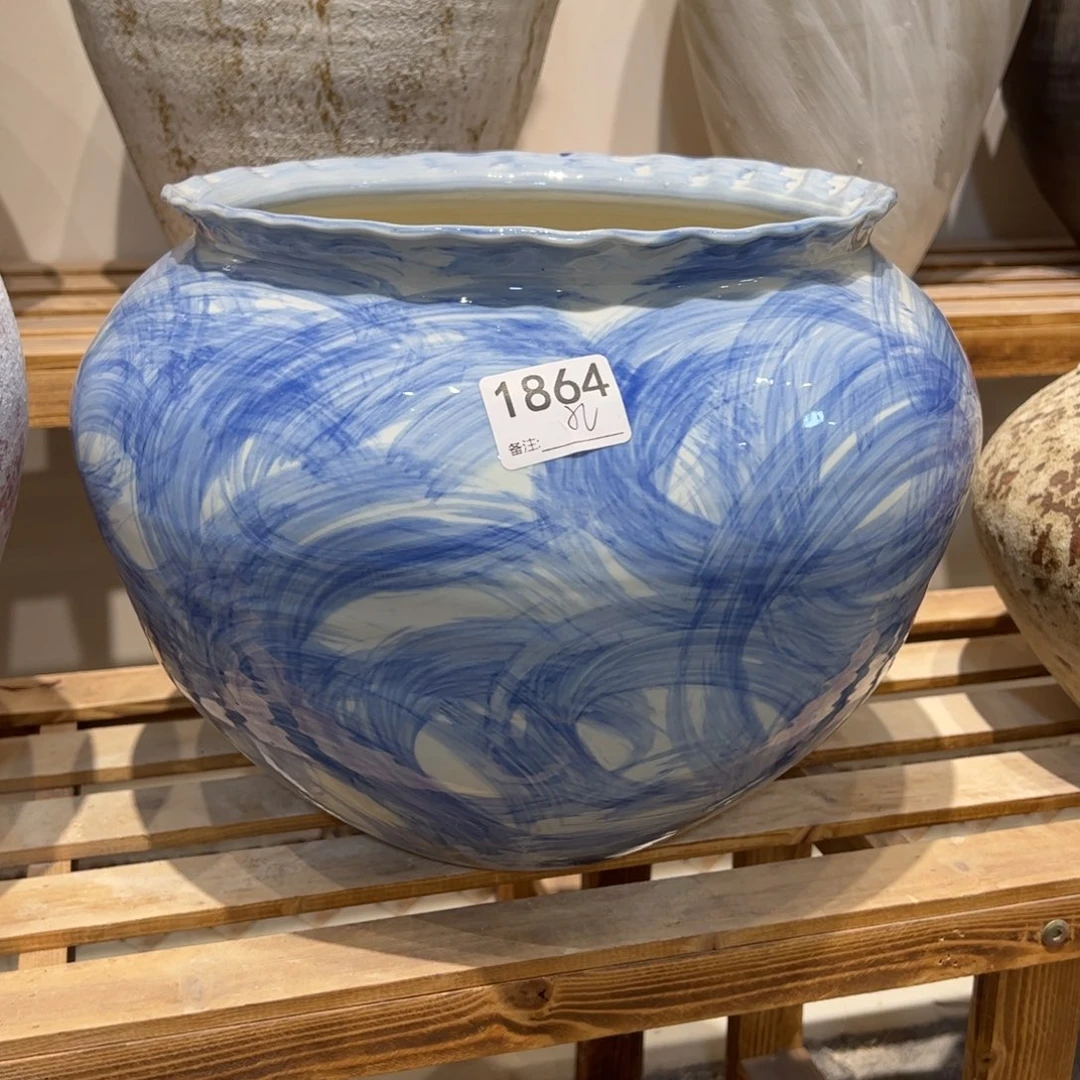 瓷片1864高27口23.5已打孔的
