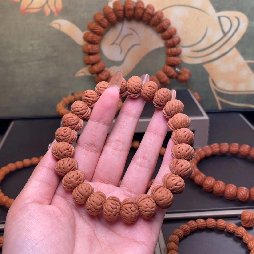 朴***花桃核吊坠14蟠桃手串