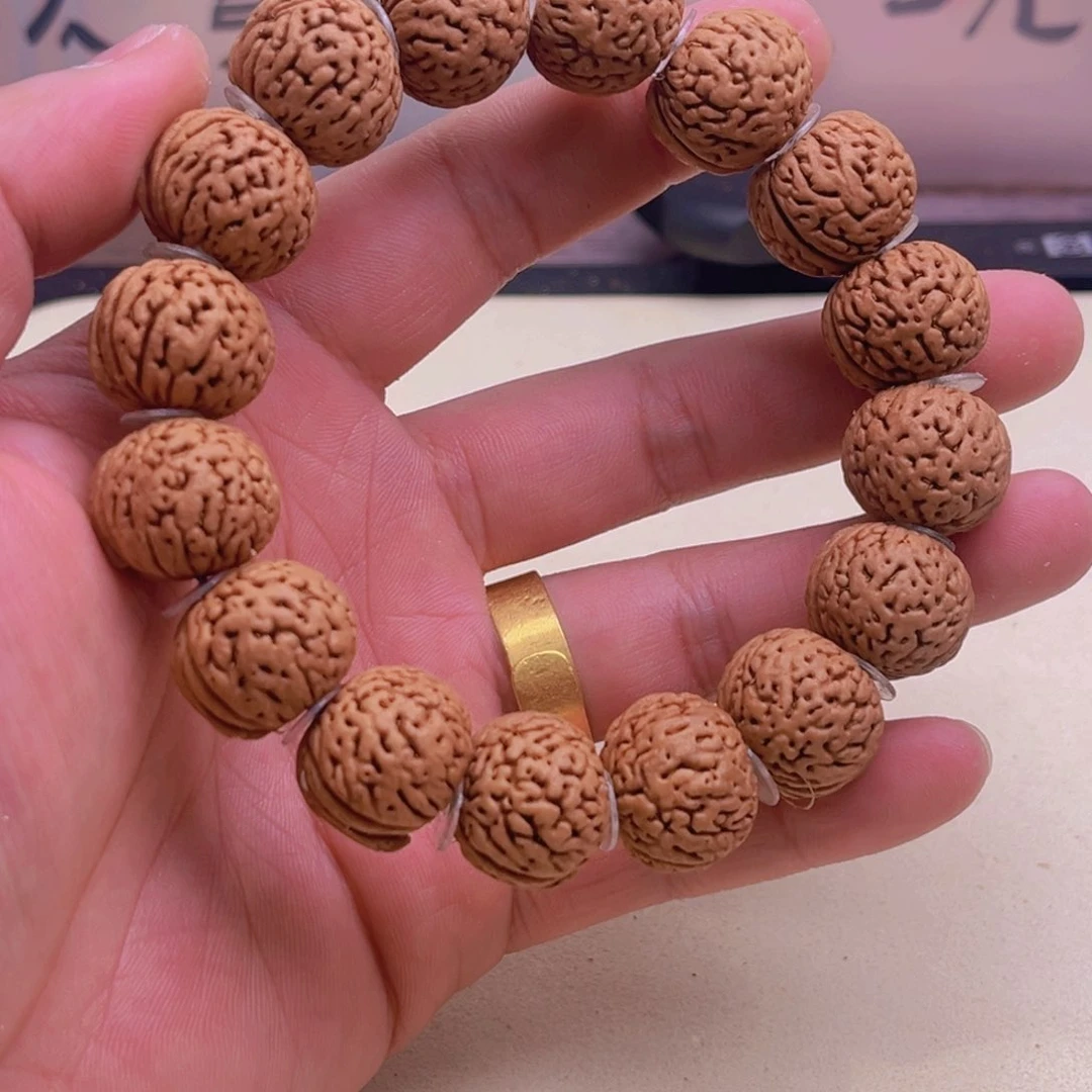 桃核手串y****甫桃核南瓜玻璃球