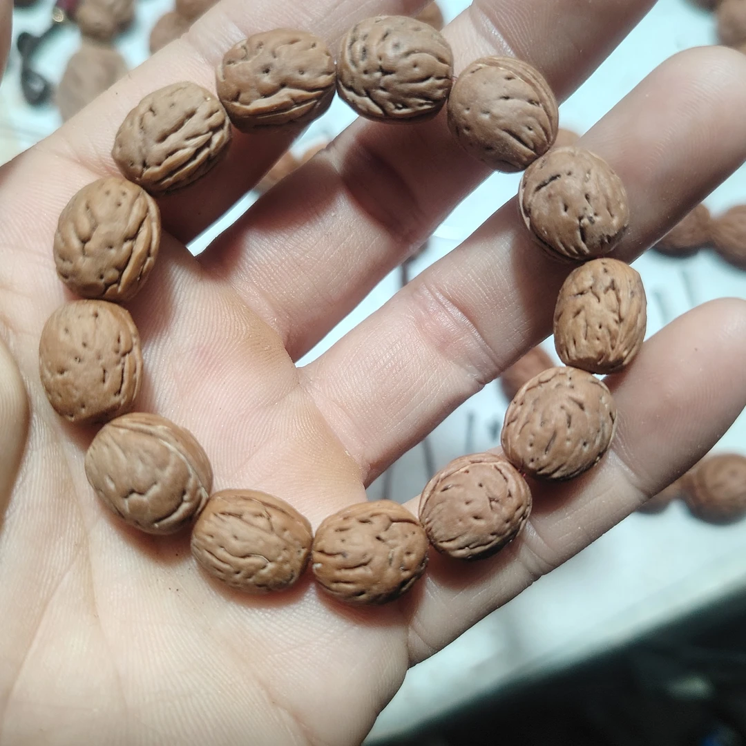 庄14以下，13颗小颗粒桃枭手串！野生毛桃桃枭正月份采摘