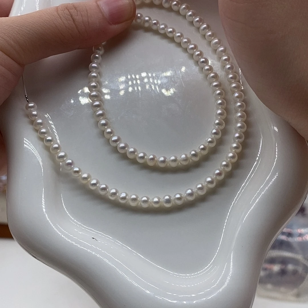 银S925镀金镶嵌淡水珍珠耳饰