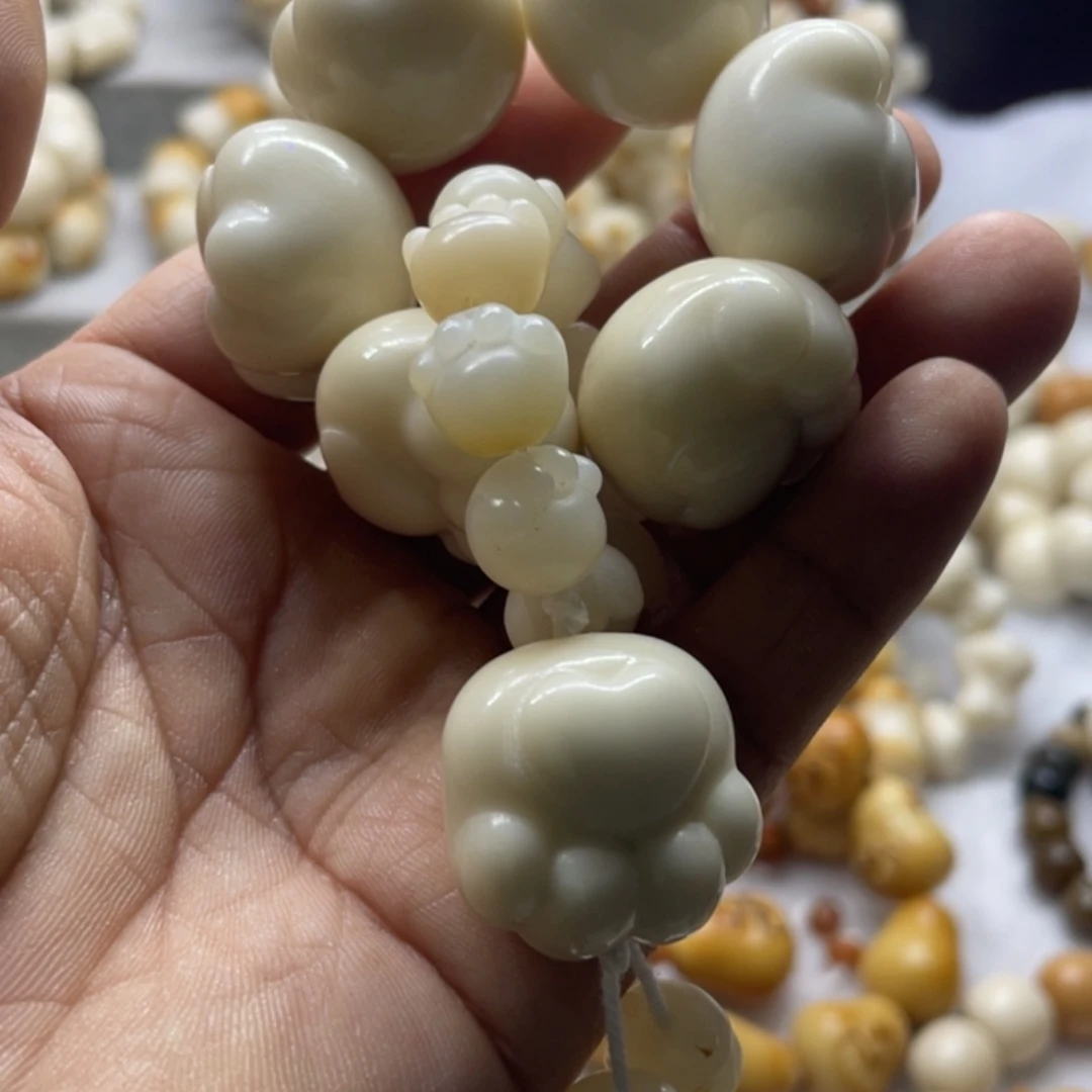 吊坠菩提根/象牙果全品熊爪手捻卡25